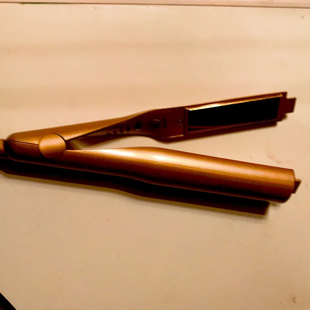 Curler and straightener in one. used twice.